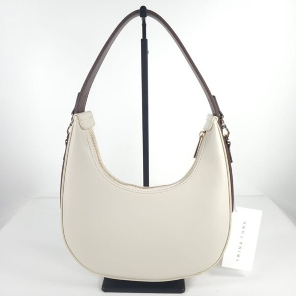 NWT TRINA TURK LEATHER OFF WHT / BROWN CRESCENT HOBO HANDBAG